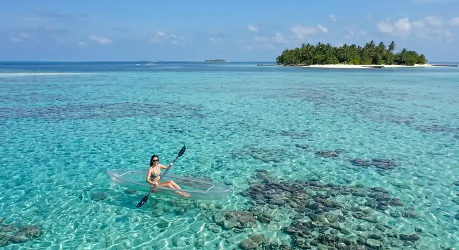 Guest enjoying a kayaking session in Semporna Turtle Garden Resort