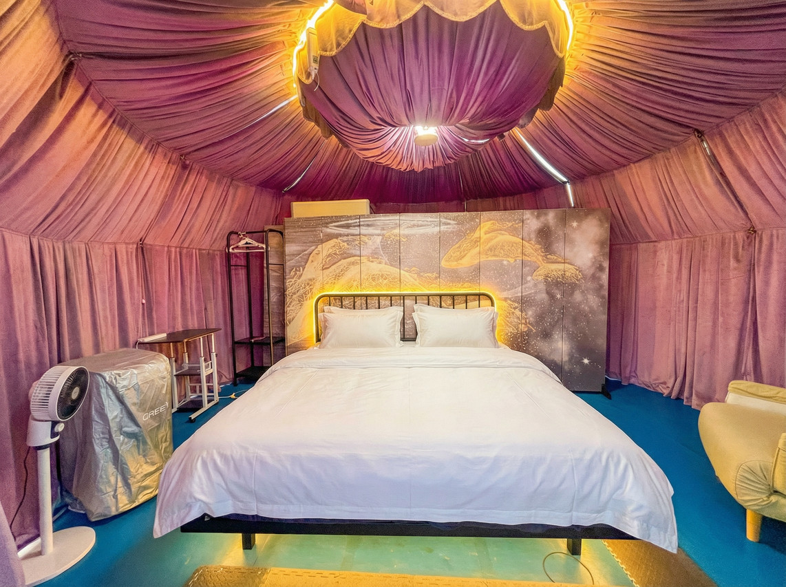 Pink canopy dome suite bedroom Turtle Garden Resort