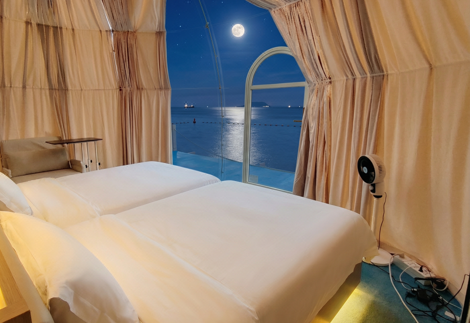 Moonlit sea view from twin dome room Turtle Garden Resort